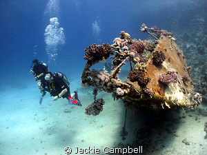 Sunken yacht at small abu galawa. Taken with canon ixus 9... by Jackie Campbell 